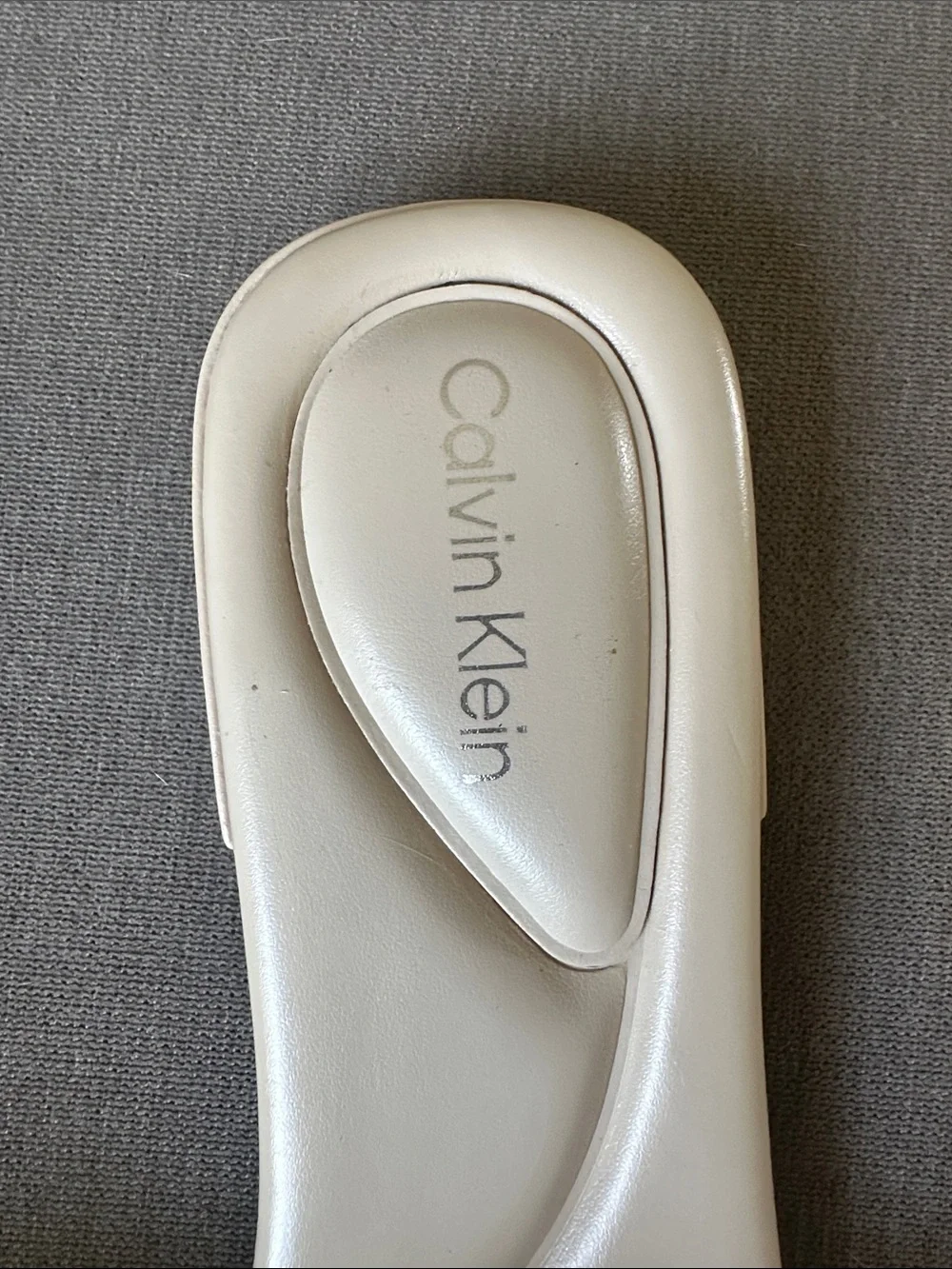 Calvin Klein Pearl White Embossed Logo Slide Sandals